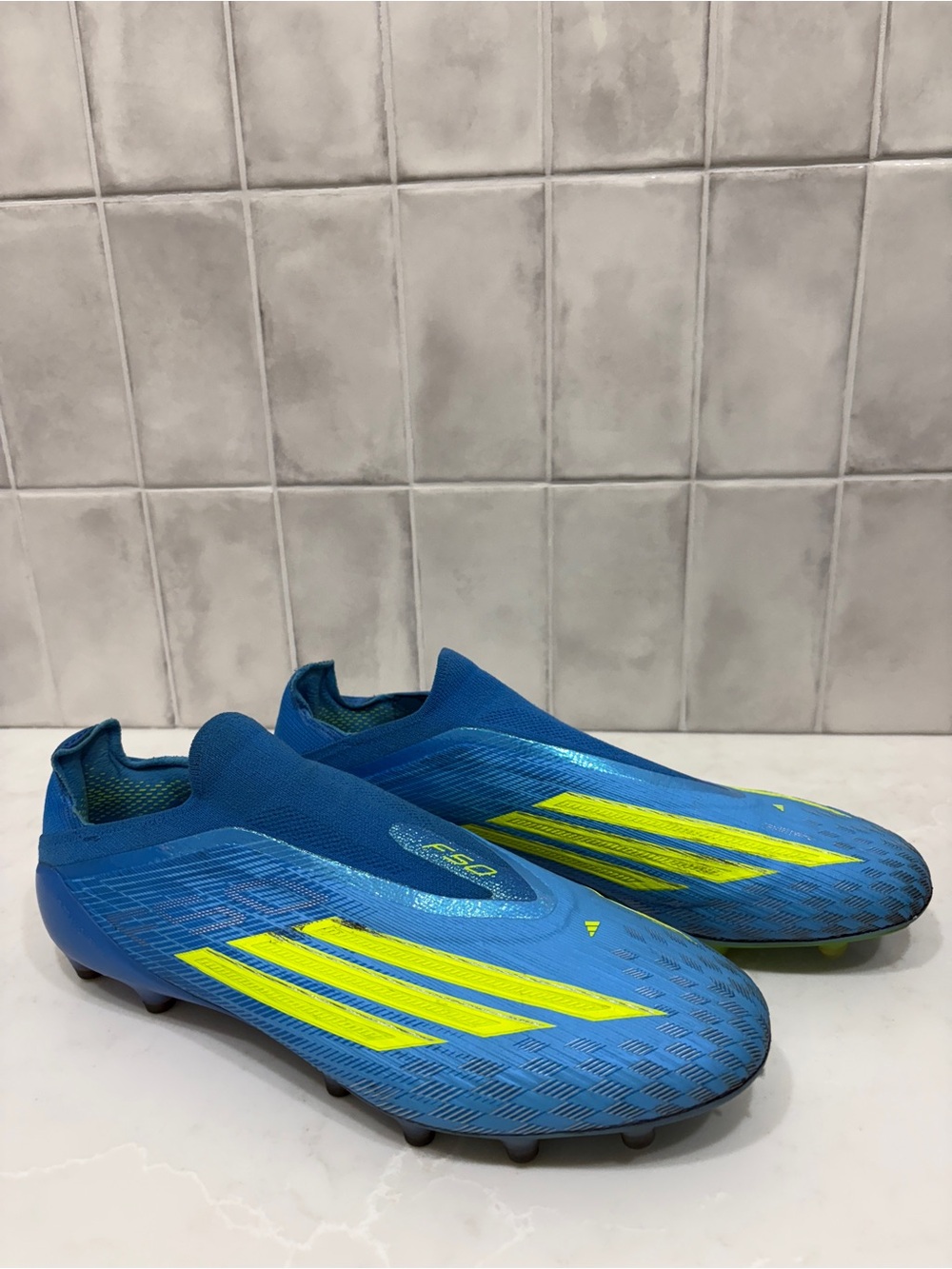adidas F50 Men's Blue Soccer Cleats with Neon Yellow Stripes